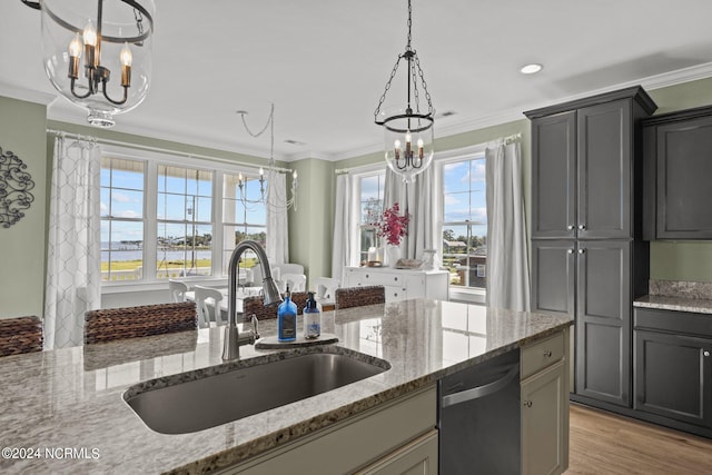 kitchen featuring dishwasher, light stone countertops, crown molding, and sink