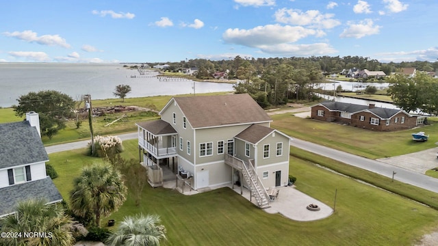 bird's eye view with a water view