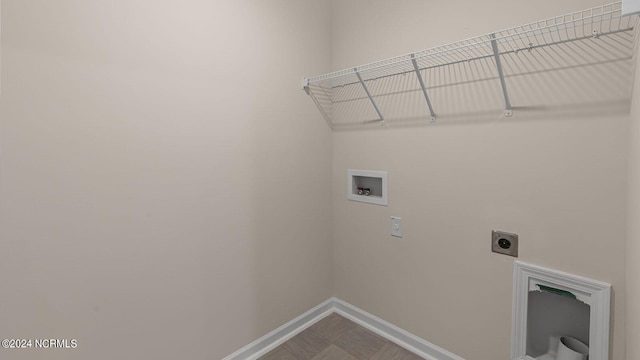 laundry area with electric dryer hookup and hookup for a washing machine