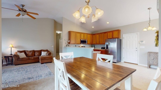 dining space featuring recessed lighting, baseboards, vaulted ceiling, and ceiling fan with notable chandelier