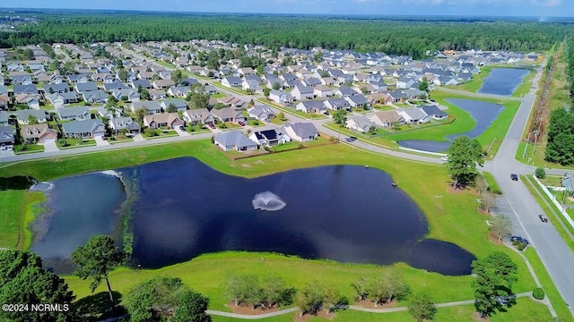 bird's eye view with a water view and a residential view