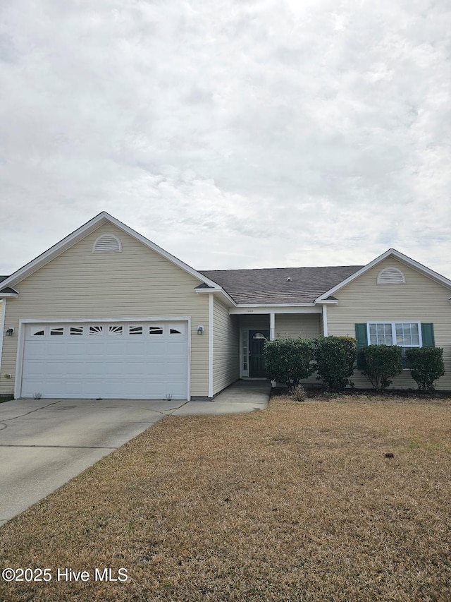 single story home with driveway, a shingled roof, a garage, and a front yard