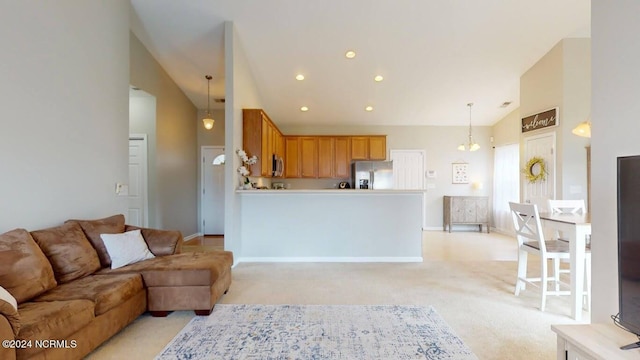 living area featuring recessed lighting, high vaulted ceiling, baseboards, and light colored carpet