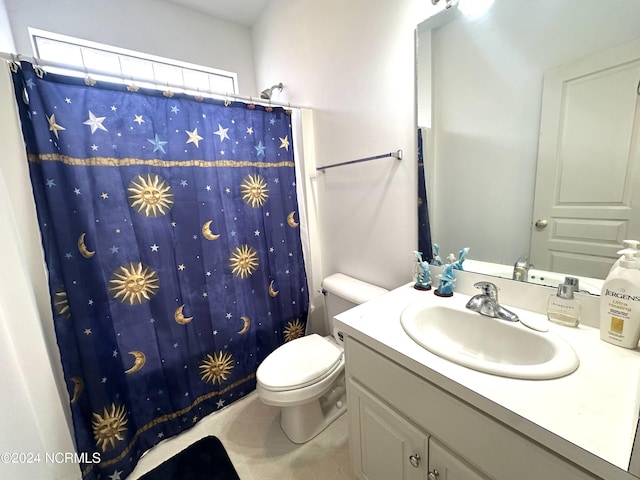 full bathroom with toilet, vanity, and a shower with shower curtain