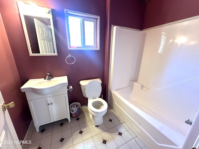 full bathroom featuring vanity, tile patterned flooring, toilet, and shower / washtub combination