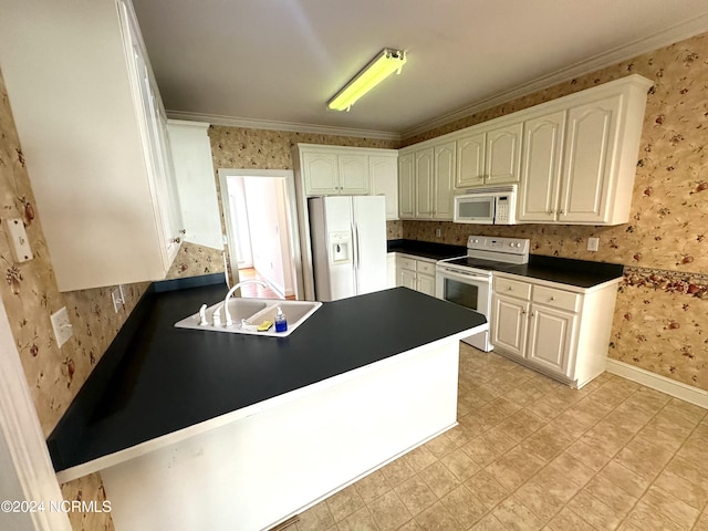 kitchen with sink, white cabinetry, kitchen peninsula, white appliances, and ornamental molding