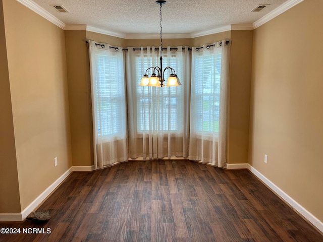 unfurnished dining area featuring ornamental molding, a chandelier, and dark hardwood / wood-style floors