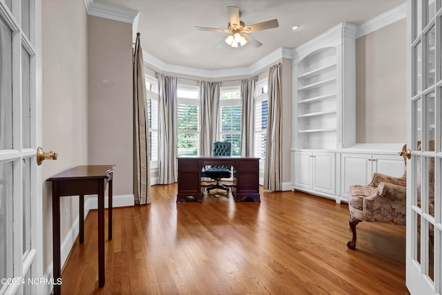 office area featuring ceiling fan, ornamental molding, and hardwood / wood-style floors