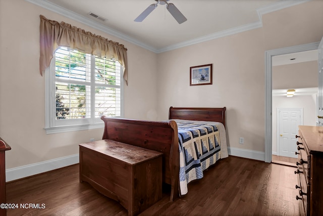 bedroom featuring ceiling fan, ornamental molding, and dark hardwood / wood-style floors