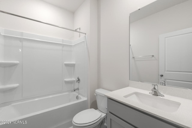 full bathroom with vanity, toilet, and  shower combination