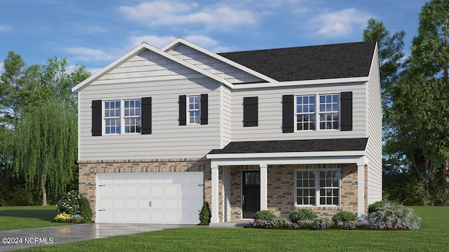 view of front of house with a front yard and a garage