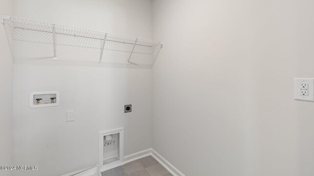 laundry area featuring washer hookup and electric dryer hookup