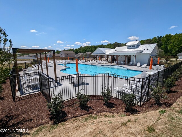 view of pool with a patio