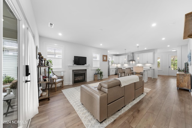 living room featuring light hardwood / wood-style floors