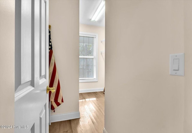 hallway featuring hardwood / wood-style floors