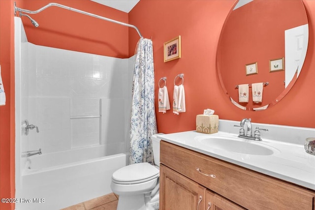 full bathroom with tile patterned floors, vanity, shower / bath combination with curtain, and toilet