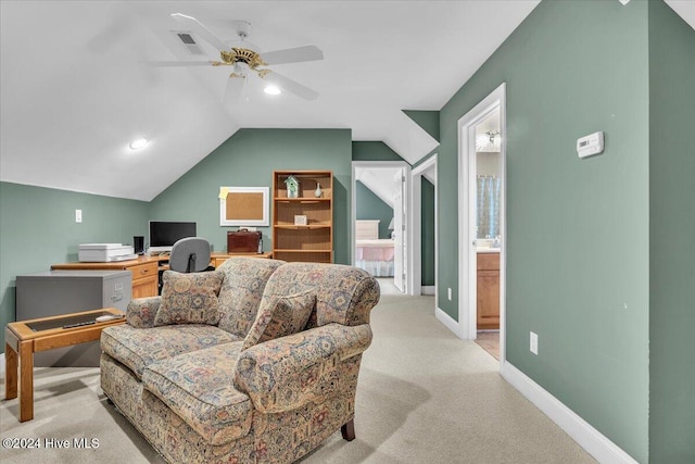 carpeted living room featuring lofted ceiling and ceiling fan