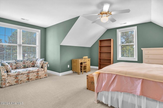 bedroom with light carpet, ceiling fan, and lofted ceiling