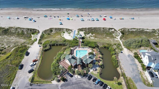 bird's eye view with a beach view and a water view