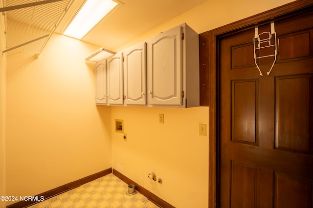 laundry area with hookup for an electric dryer, washer hookup, cabinets, and gas dryer hookup