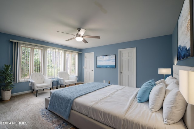 bedroom featuring ceiling fan and carpet flooring