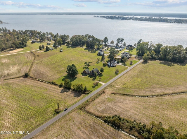 bird's eye view featuring a water view and a rural view