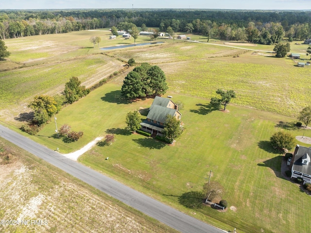 birds eye view of property featuring a rural view