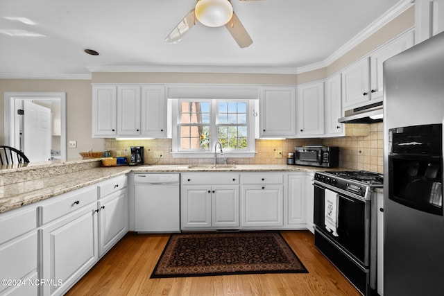 kitchen with light hardwood / wood-style floors, black gas range oven, dishwasher, white cabinets, and stainless steel fridge with ice dispenser