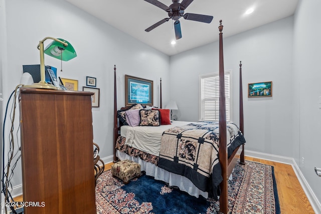 bedroom featuring wood-type flooring and ceiling fan