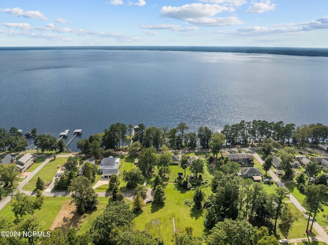 drone / aerial view with a water view