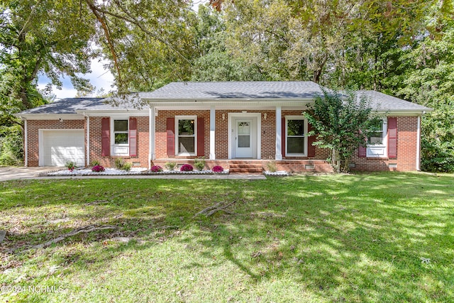 ranch-style house featuring a front yard, a garage, and a porch