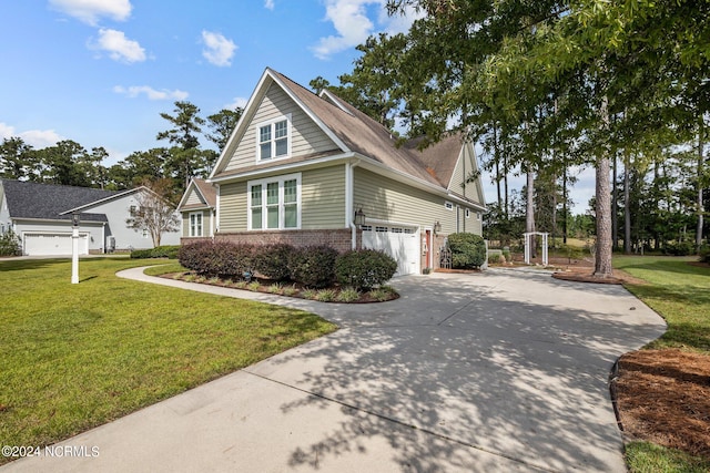 view of front facade featuring a garage and a front lawn