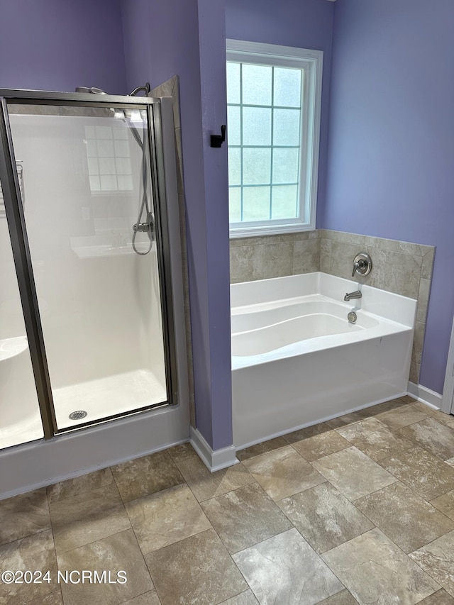 bathroom with independent shower and bath