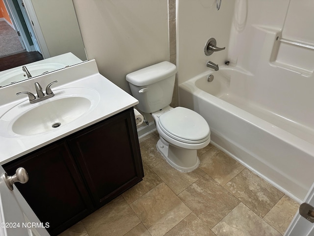 full bathroom with shower / tub combination, vanity, and toilet