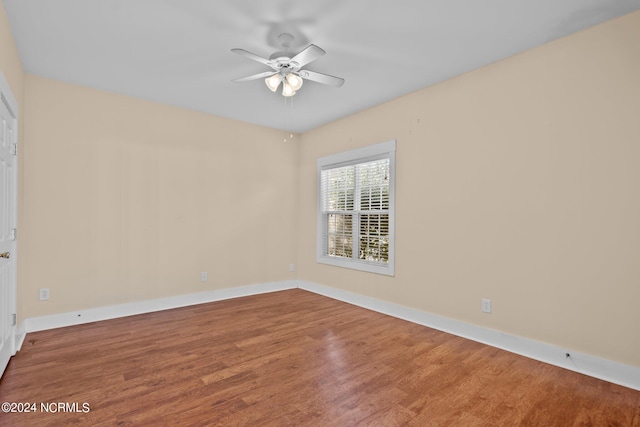 unfurnished room featuring wood-type flooring and ceiling fan