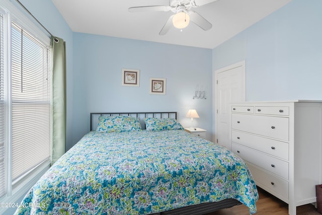 bedroom featuring hardwood / wood-style floors and ceiling fan