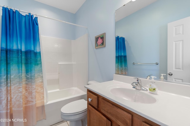 bathroom featuring vanity, shower / bathtub combination with curtain, and toilet