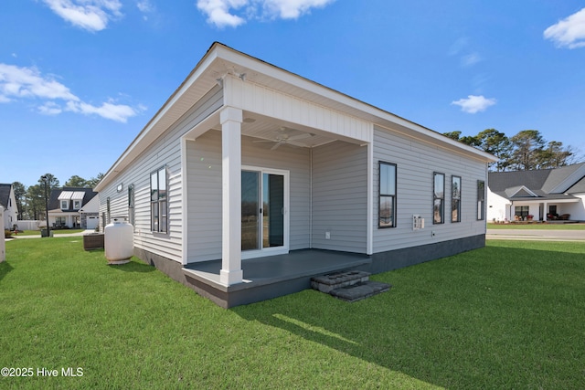 view of home's exterior with a lawn