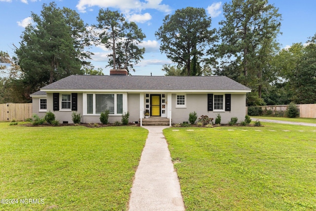 ranch-style house with a front yard