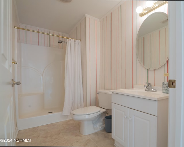 bathroom featuring vanity, tile patterned flooring, toilet, and a shower with shower curtain