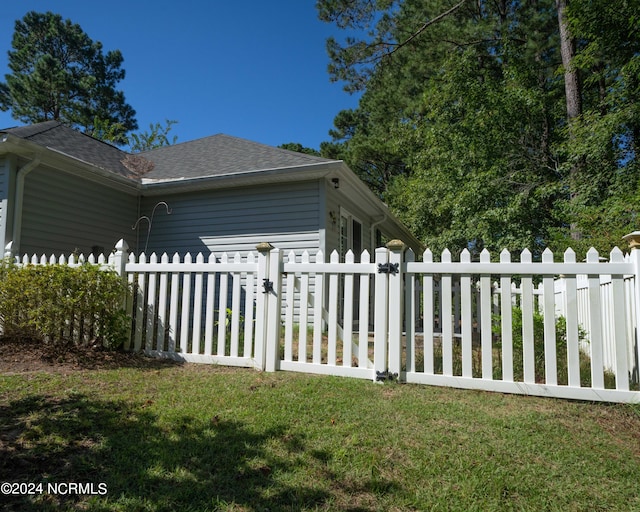 view of home's exterior featuring a yard