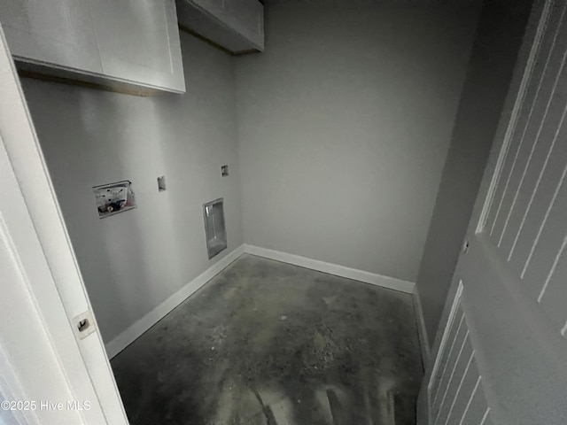 clothes washing area featuring cabinets and washer hookup