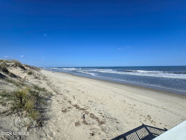 property view of water featuring a view of the beach