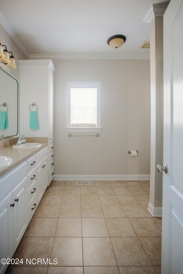 bathroom with vanity, tile patterned flooring, and ornamental molding