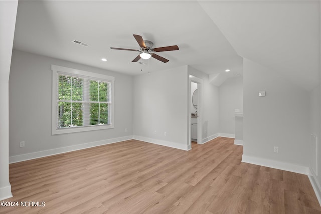 unfurnished living room featuring ceiling fan and light wood-type flooring