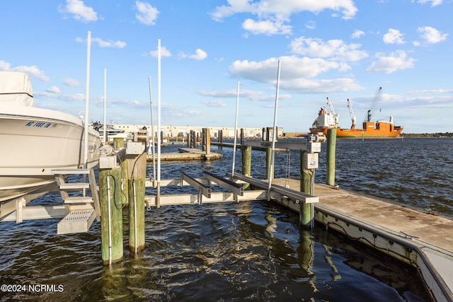 dock area featuring a water view