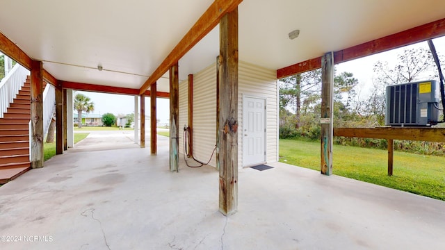 250 Riverside Dr, Sneads Ferry, NC 28460 - view of patio featuring stairway and a carport