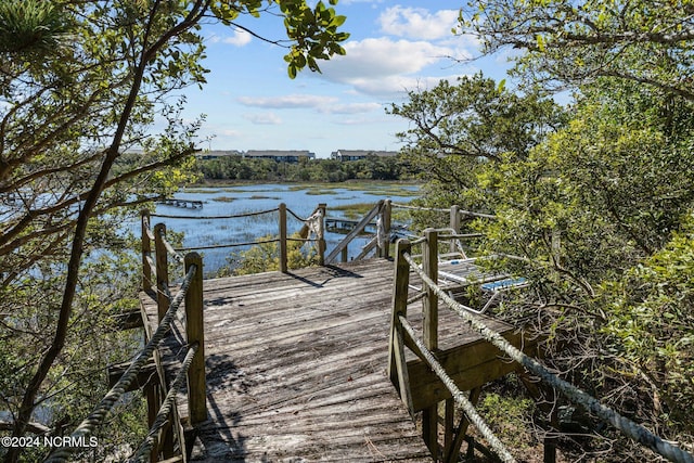 view of dock with a water view