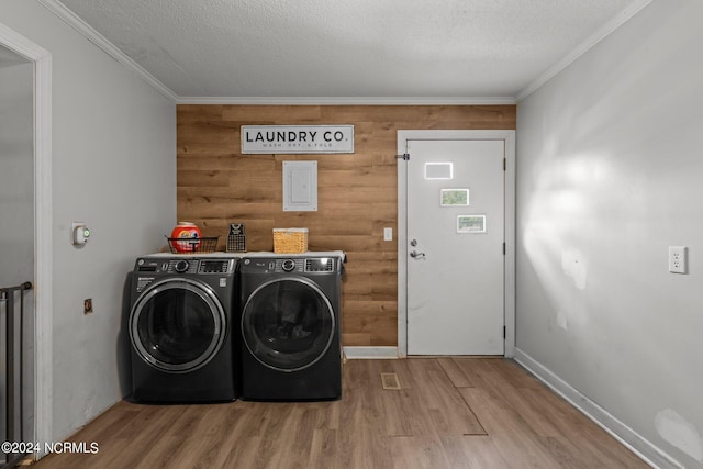 775 Gray Rd, Vanceboro, NC 28586 - laundry room featuring independent washer and dryer, wood finished floors, crown molding, a textured ceiling, and baseboards