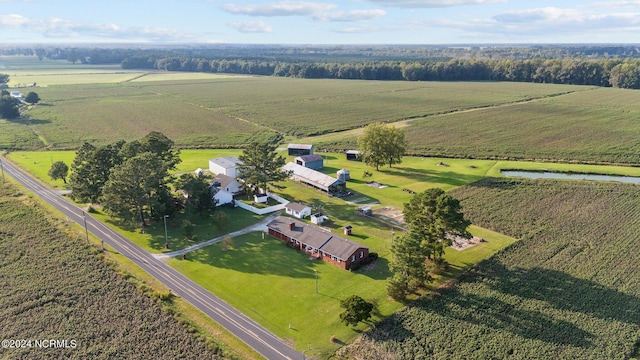 birds eye view of property with a rural view